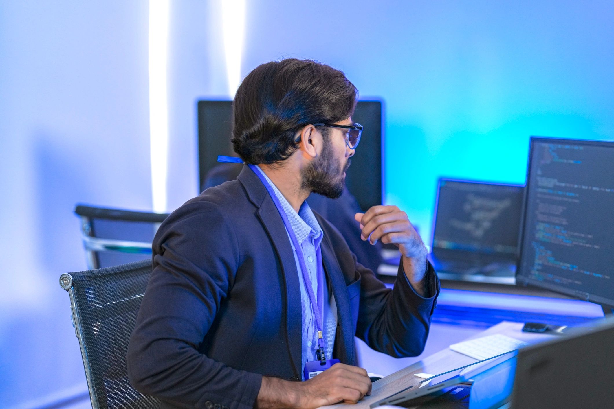 Modern workspace with computers and collaboration